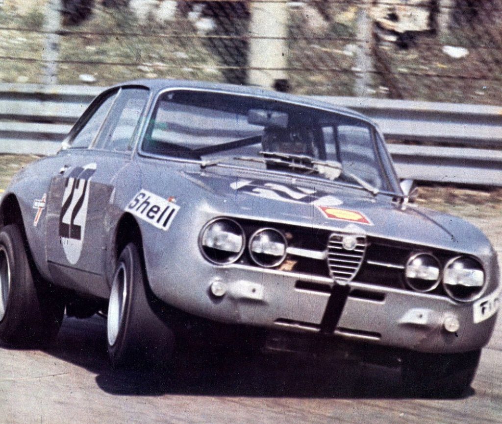 1064px-Andrea_De_Adamich_-_Alfa_Romeo_Giulia_2000_GTAm_(1972_Monza_4_Hours)