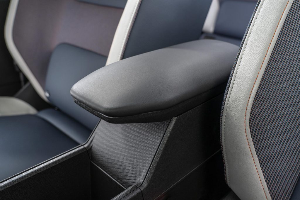 detailed view of front seat materials and center storage console